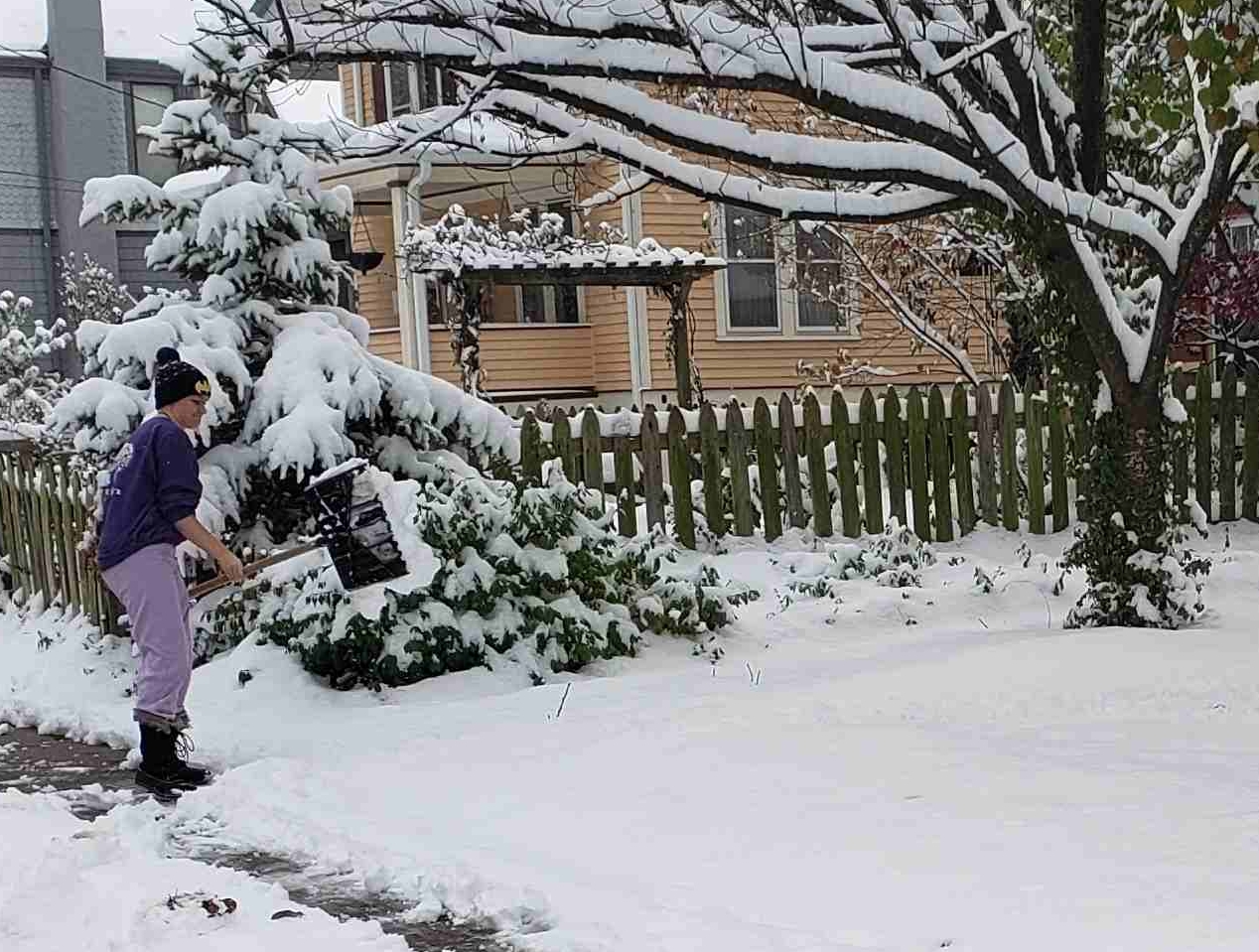 Cate shoveling snow.jpg